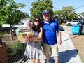 Cat Westover poses with her gift basket and Joe Carcione.