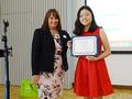 SILVAR REALTOR&reg; Davena Gentry presents the Silicon Valley REALTORS&reg; Charitable Foundation scholarship award to Audrey Cheng, graduating senior from Gunn High School.