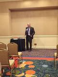 Region 9 Chair David Tonna about to start the caucus.
