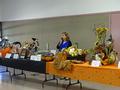 District Chair Katherine Frey opens the auction for bidding.