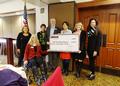 Left to right are Katherine Frey, Karen Trolan, Denise Welsh, Dennis Cima, Teresa Ong, Tess Chandler and Eileen Giorgi
