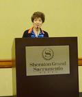Denise Welsh welcomes everyone to the joint luncheon.