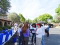 Los Altos/Mountain View District RSVP chair Diyar Essaid checks in the volunteers as they arrive.