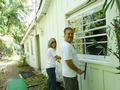 Kathryn Tomaino and Steve Klesczewski wash windows for a 74-year-old Los Altos homeowner.