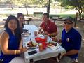 Members enjoyed food from Andy's Bar-B-Que. There's Chris Alston, Jimmy Kang and Hannah Isaka.