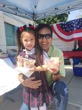 After her first day at kindergarten, Dad treated this little lady to ice cream.