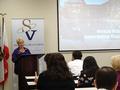 Joanne Fishpaw Fraser, CRS and Global Business Council (GBC) member, welcomes everyone to the program.