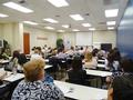 The room was filled to capacity.