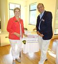 Joanne Fraser and Gregg Fujita at the Residential Real Estate Council information table.