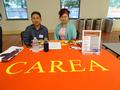 Dexter Lat and president Jennifer Chen at the Chinese American Real Estate Association (CAREA) table.