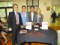 Greeters at the Asian Real Estate Association of America Silicon Valley (AREAA SV) table.