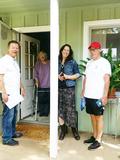 Dave Barca and Tom Huff get ready to help the homeowner.