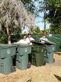 Kacy Buchin and Doug Miyako with a homeowner