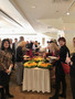 Members line up for breakfast.