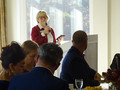 Past District Chair and 2019 President-elect Mary Kay Groth greets members