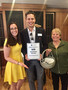 Drawing winner of $50 Vina Enoteca gift certificate Jeff Sanders, with Wells Fargo, poses with Menlo Park-Atherton District Chair Jasmine Lee and Palo Alto District Chair Lynn Wilson Roberts (far right).