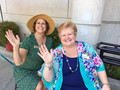 Affiliates Leslie Butlar and Caroline Wolf greet members and guests