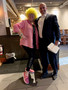 Check out President-elect Mary Kay Groth's leggings! Everyone knows what she does. Here she is with Ryan Nunnally, who helped distribute the paddles to bidders.