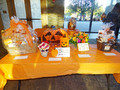 The centerpieces and arrangements included gift certificates to local restaurants, bottles of wine, including a $500 gift card to Ciao Bella.