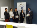 CREBA VP of International Affairs Vangie Yia presents SILVAR President Alan Barbic with a present.