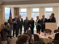 The gavel was passed from Dennis Byron (2004) to David Tonna (2006), Doug Evans (2011), Alan Barbic (2015), Suzanne Yost (2016), Mary Kay Groth (2017), Ryan Nunnally (2018), on to Hamilton, who then handed it to Doyle.