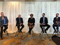 Moderator Chris Isaacson (Coldwell Banker) asks panelists questions.