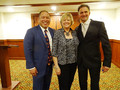Mary Kay Groth is flanked by Sereno Group co-founders Ryan Iwanaga and Chris Trapani, the evening's MC.