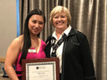 SILVAR President Mary Kay Groth congratulates 2020 WCR SV President Thuy Tran.