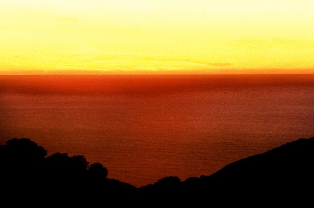 Yellow sky, bronze-red Pacific, Big Sur, California