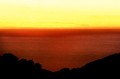 Yellow sky, bronze-red Pacific, Big Sur, California