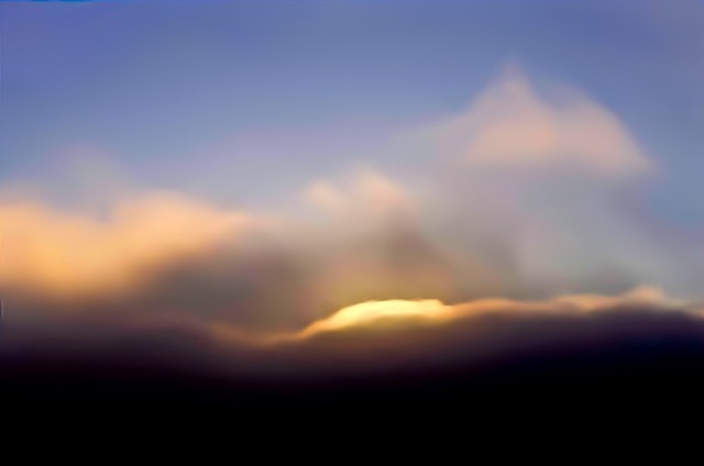 Cloud glows gold, Big Sur, California