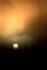 Cyclops-sun in storm clouds (#3, vertical)... Big Sur, California