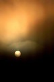 Cyclops-sun in storm clouds (#3, vertical)... Big Sur, California