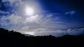 Sun and dispersing clouds, Big Sur, California