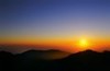 Sun sinks into lava sea, Big Sur, California