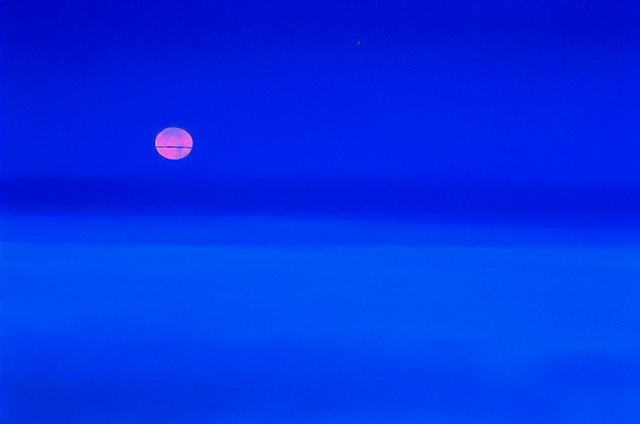 Moonset at dawn, Big Sur, California