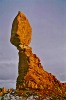 Setting sun on Balanced Rock, Arches National Park, Utah