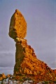 Setting sun on Balanced Rock, Arches National Park, Utah
