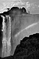 Victoria Falls and rainbow in black and white (vertical)... Victoria Falls National Park, Zimbabwe