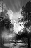 Sun setting behind Castle Geyser (black and white, #2), Yellowstone National Park, Wyoming