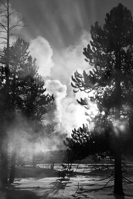 Sun setting behind Castle Geyser (black and white, #2), Yellowstone National Park, Wyoming