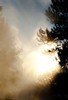 Sun setting behind Castle Geyser (color, #3), Yellowstone National Park, Wyoming
