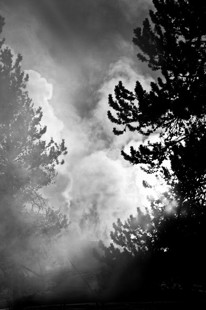 Sun setting behind Castle Geyser (black and white, #4), Yellowstone National Park, Wyoming
