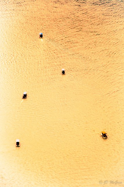 Tour Boats Head to Harbor at Sunset