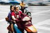 Couple Riding Motor Scooter in Xingping