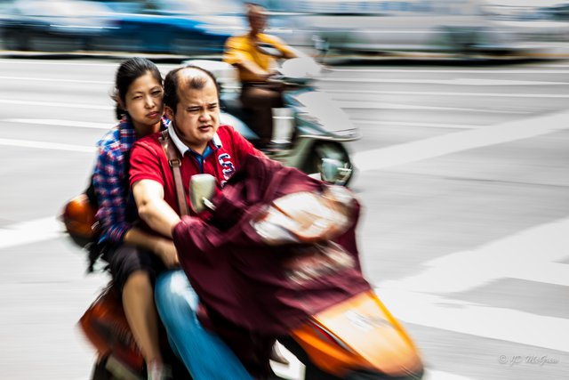 Couple Riding Motor Scooter in Xingping