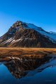 Single Peak Reflecting off Lake in South Coast Iceland
