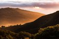 Sun Glows from Behind Big Sur Shoulders