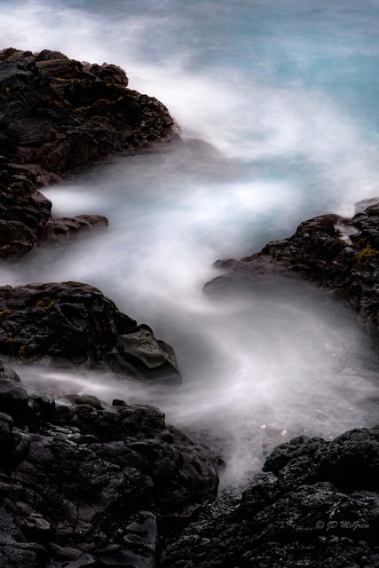 Surf Flows Over a Rocky Shore