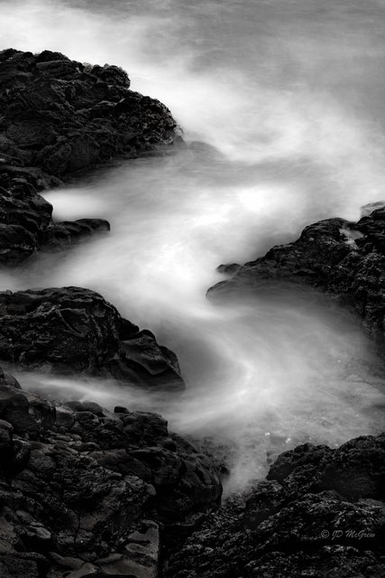 Surf Flows Over a Rocky Shore, #2, black and white